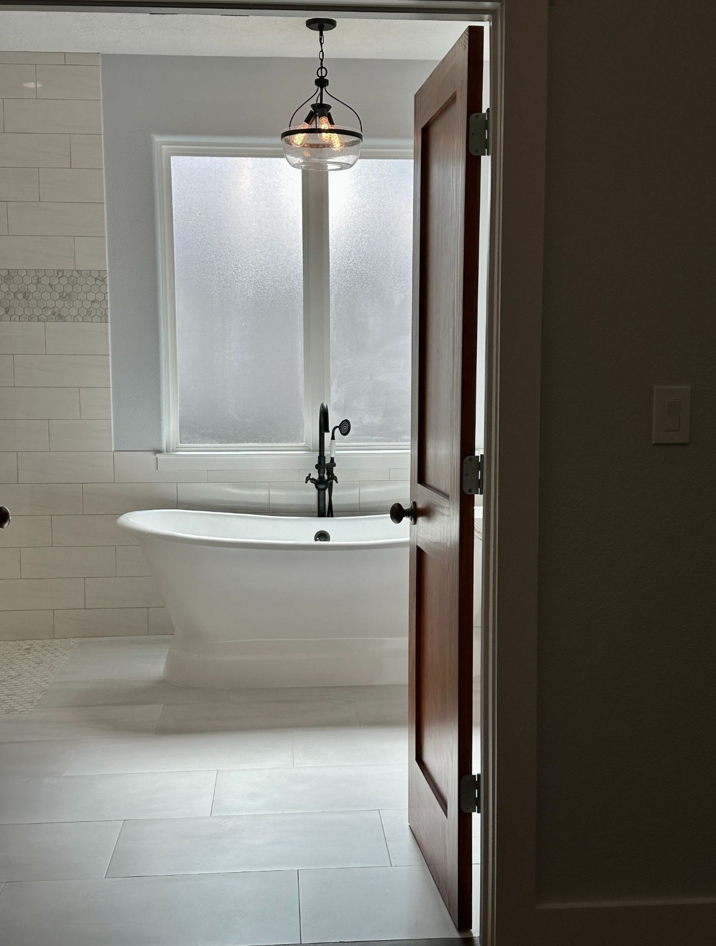 Bathroom with freestanding tub.