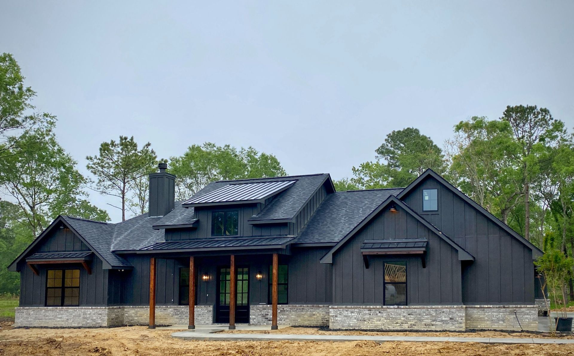 Custom Home Exterior with a dark exterior color scheme.